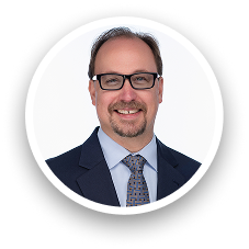 Portrait of Eric Powell, professional team member at Carey UK