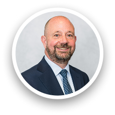 Portrait of Greg Mendoza, professional team member at Carey UK
