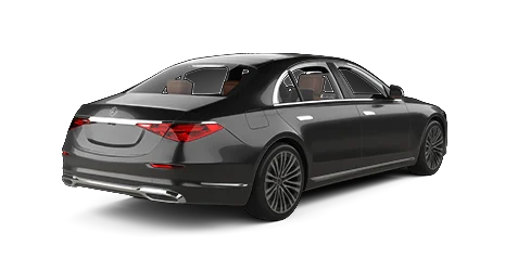 A black Mercedes-Benz luxury sedan is shown from a rear-side angle, highlighting its sleek design, sculpted taillights, and spacious interior with brown seats