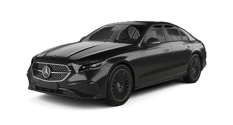A black Mercedes-Benz sedan is shown from a front-side angle, featuring a diamond-pattern grille with the Mercedes emblem, sculpted headlights, and sleek alloy wheels